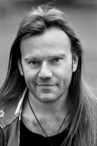 Svartvit ansiktsbild av Per-Owe Solvelius.