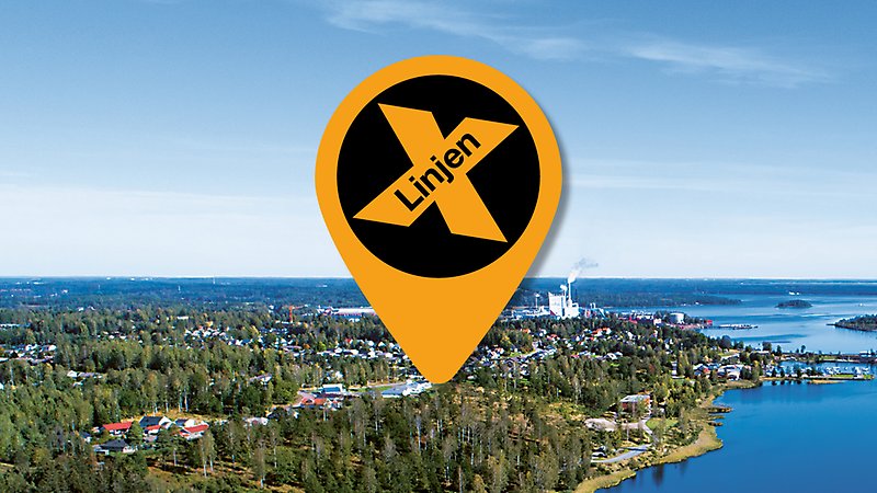 Pil som pekar mot Grums i en flygbild. I pilen står det X-linjen.
